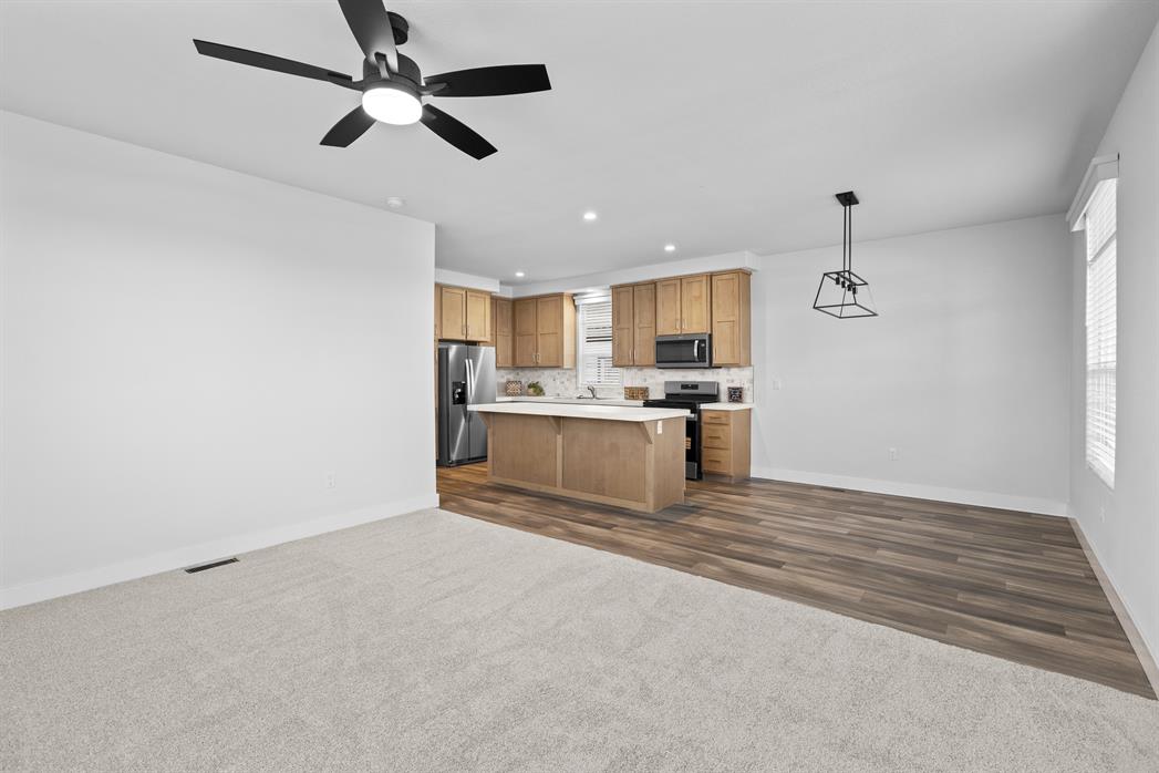 Open-concept living area with great flow into the kitchen