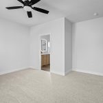 Private primary suite designed for rest and relaxation